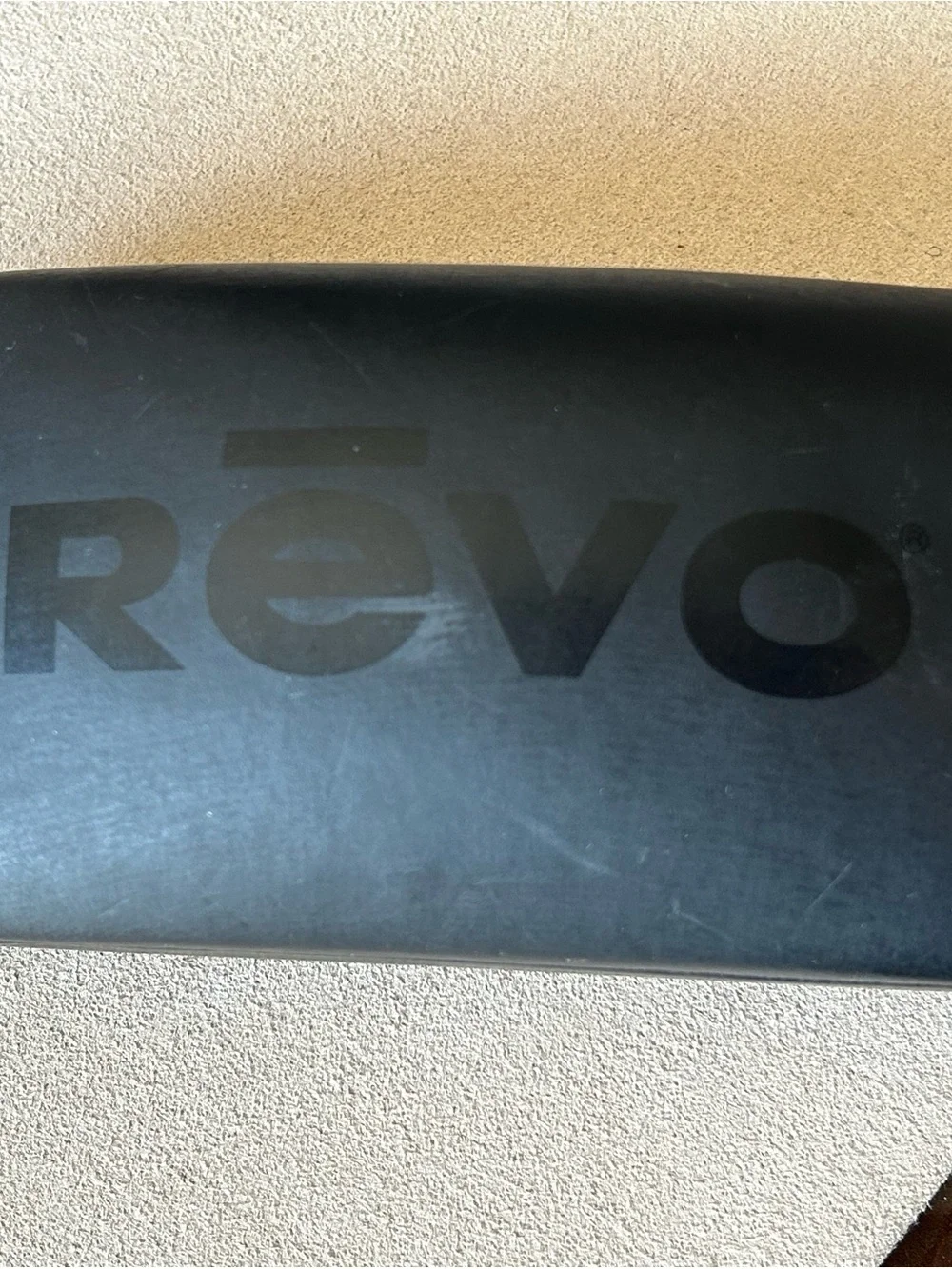 Revo Polarized Sunglasses — Black Frame with Blue Logo